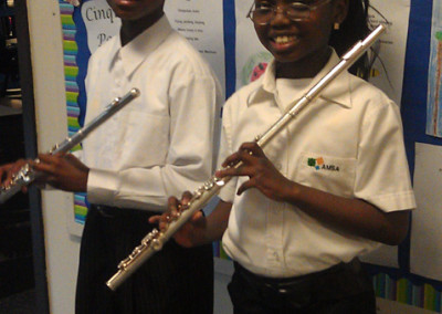 Young brother and sister flutists