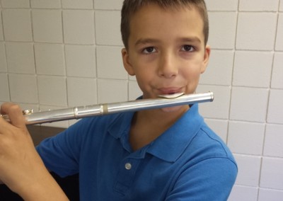 Young boy flutist